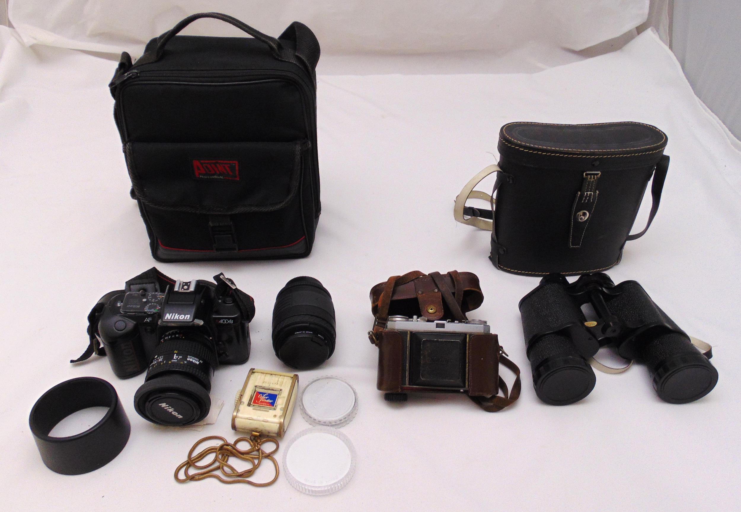 Nikon AF camera and accessories, a pair of binoculars in fitted case and a Kodak Retina camera in