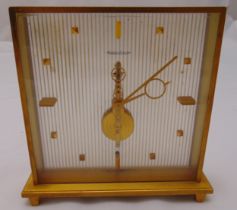 Jaeger LeCoultre rectangular gilt metal mantle clock on four peg feet, 16 x 16.5 x 4cm