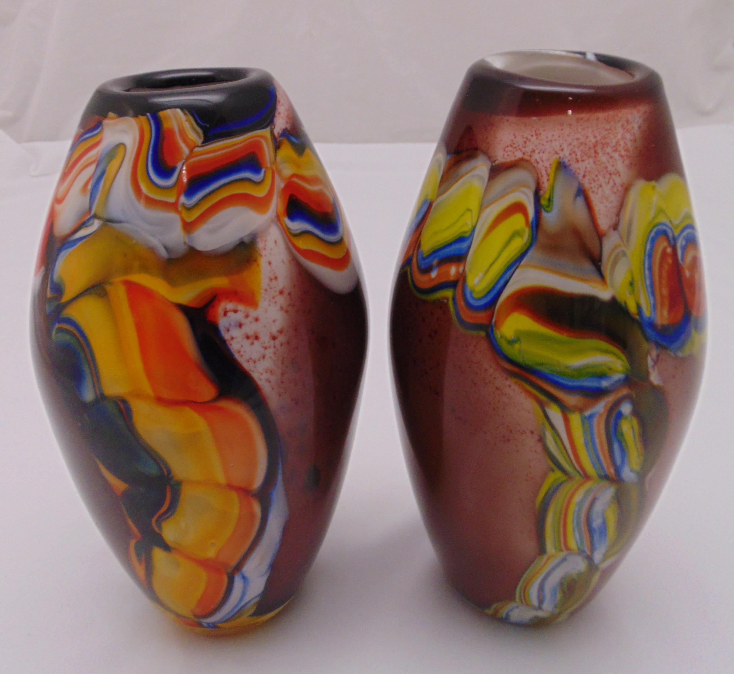 A pair of ovoid glass polychromatic vases, 27.5cm (h)