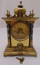 A French rectangular gilt metal mantle clock with gilded dial Arabic numerals and champlevé