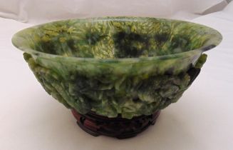 Jadeite bowl carved with applied dragon figurines on the side, to include hardwood stand and