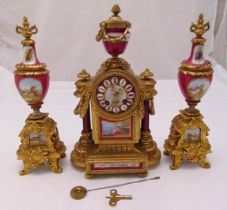 A late 19th century French clock set, the circular dial with Roman numerals and vase form finial,