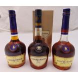 Three bottles of Courvoisier cognac one in original packaging, 70cl bottles