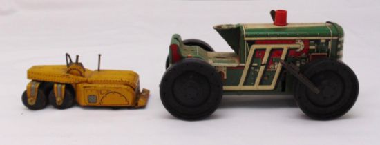 A vintage litho tin plate tractor and a vintage litho tin plate roller both play worn