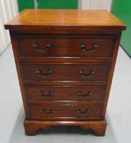 A late 19th century rectangular mahogany four drawer chest of drawers with brass handles on four