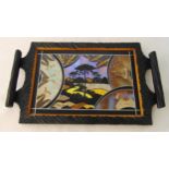A framed rectangular tea tray comprising a landscape composed of coloured butterfly wings, 23 x