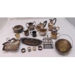A quantity of silver plate to include a teaset, toast rack and dishes