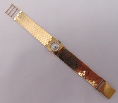 Betina 9ct gold ladies wristwatch on a 9ct gold articulated bracelet, approx total weight 38.8g