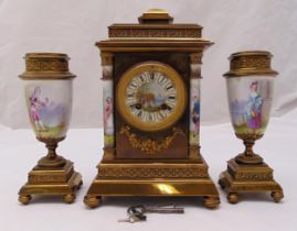 A 19th century French mantle clock of rectangular form, lacquered metal, the painted enamel dial