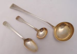 A Georgian hallmarked silver soup ladle, London 1804, a Georgian hallmarked silver sauce ladle circa