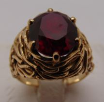 9ct yellow gold and garnet dress ring, approx total weight 8.40g