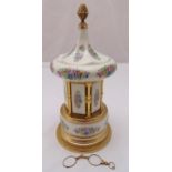 A pair of gilt metal lorgnettes and a ceramic and gilt metal cigarette holder carousel