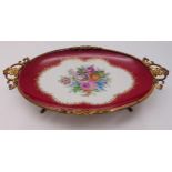 A Limoges oval table centre piece mounted on a gilt metal base decorated with flower and leaves, 7 x