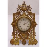 A brass easel clock with white enamel dial and Roman numerals, 33 x 21cm A/F