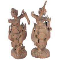 Two large South-East Asian Yaksha carved hardwood figures. Tallest - 70cm. Both missing right