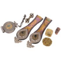 A quantity of Tibetan ceremonial items, including a pair of chatelaine or belt ornaments, a