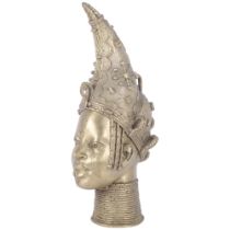 A mid-century Yoruba Benin polished bronze head of Queen Oni, with fine cast detail. H - 39.5cm.