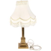 A large brass Corinthian column table lamp with associated shade. H - 67cm.