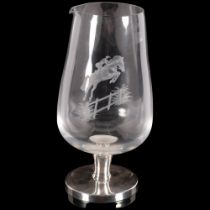 A large glass wine flagon on sterling silver base, with engraved horse and rider, height 25cm Good