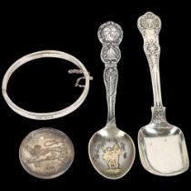 A group of silver items, to include 2 sterling silver spoons, a silver bangle, boxed, and a cased