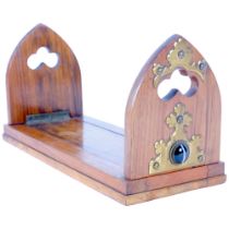 BETJEMANN - A Victorian walnut self closing book rack with brass mounts and banded agate bosses. L -