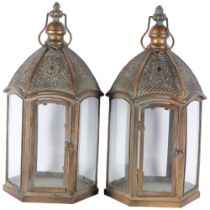 A pair of copper lanterns with glass panels, H50cm