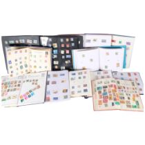 A collection of world stamps in albums.