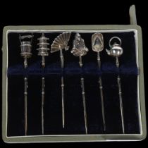 A cased set of 6 Oriental sterling silver novelty cocktail sticks