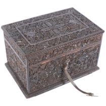 An Indian ornate coromandel jewel box, with all over relief carved decoration. W - 30cm. Good