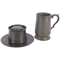 A pewter quart tankard engraved Thos Jarrett Ferry Boat Inn Rye, stamped VR1892, and a large Capstan