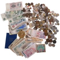 A quantity of UK and worldwide banknotes, UK pre-decimal coins, etc