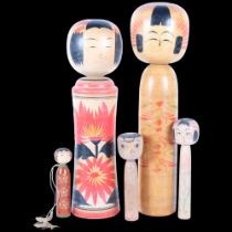A group of 5 Japanese Folk Art Kokeshi dolls, Largest - 54cm.