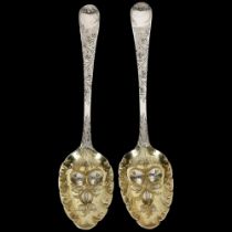 A pair of George III silver berry spoons with gilded bowls, maker's marks for George Smith (III),