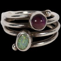 A mid-20th century Danish modernist amethyst and composite opal spiral ring, unmarked white metal