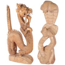 2 large carved wood figures, depicting a dragon and a cobra, H66cm