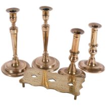 2 pairs of Georgian brass candlesticks, tallest 24cm, and a brass cribbage board