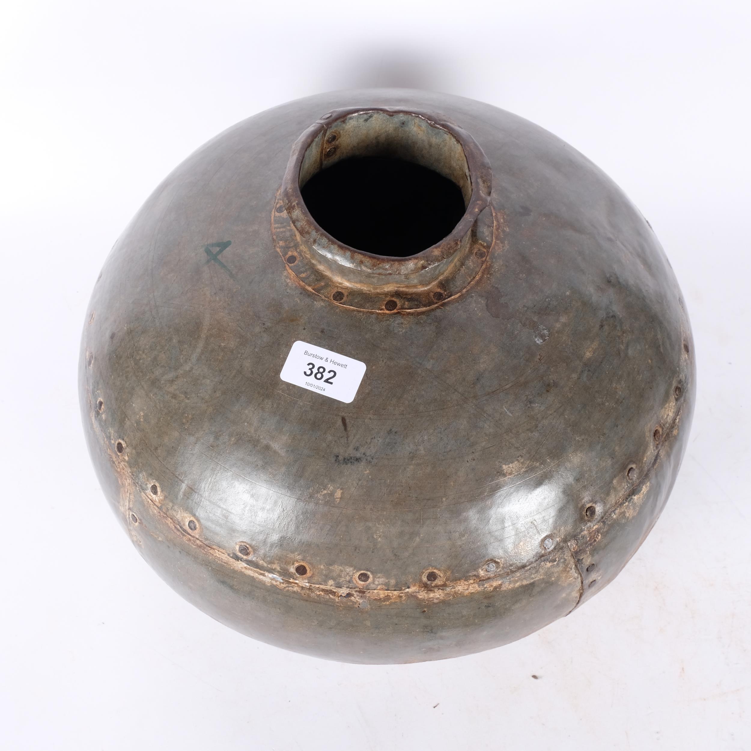 A studded metal industrial vase. 35cm diameter - Image 2 of 2