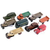 A group of loose Dinky toys, to include a Dodge tipping wagon, several flat bottom trucks and