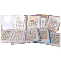 7 albums of world stamps, including Australia, Belgium, Germany, Canada etc.