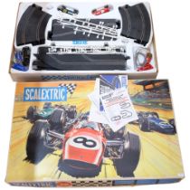 A boxed Scalextric Grand Prix 75 set