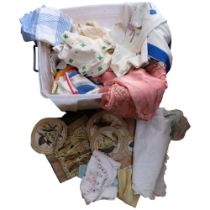 A box of Vintage table linen, including an applique work table cloth with floral design