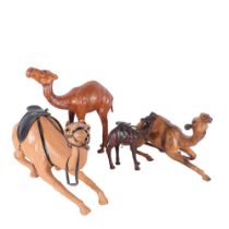 A group of leather clad camels, longest 45cm (4)