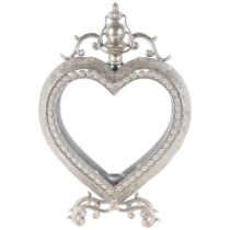 A candle lantern in glazed silvered metal heart-shape frame, H50cm