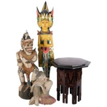 A carved and hand painted Hannuman carving, H57cm, a carved Denesian painted wall figure, a wooden
