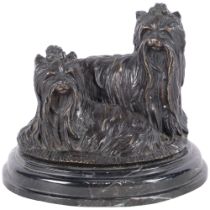 A bronze sculpture of a pair of Yorkshire Terriers, on marble base, indistinctly signed, H12cm