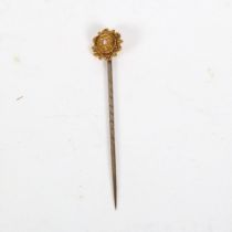 A Victorian 15ct gold split pearl Etruscan Revival stickpin, circa 1890, head 10.8mm, overall 59.