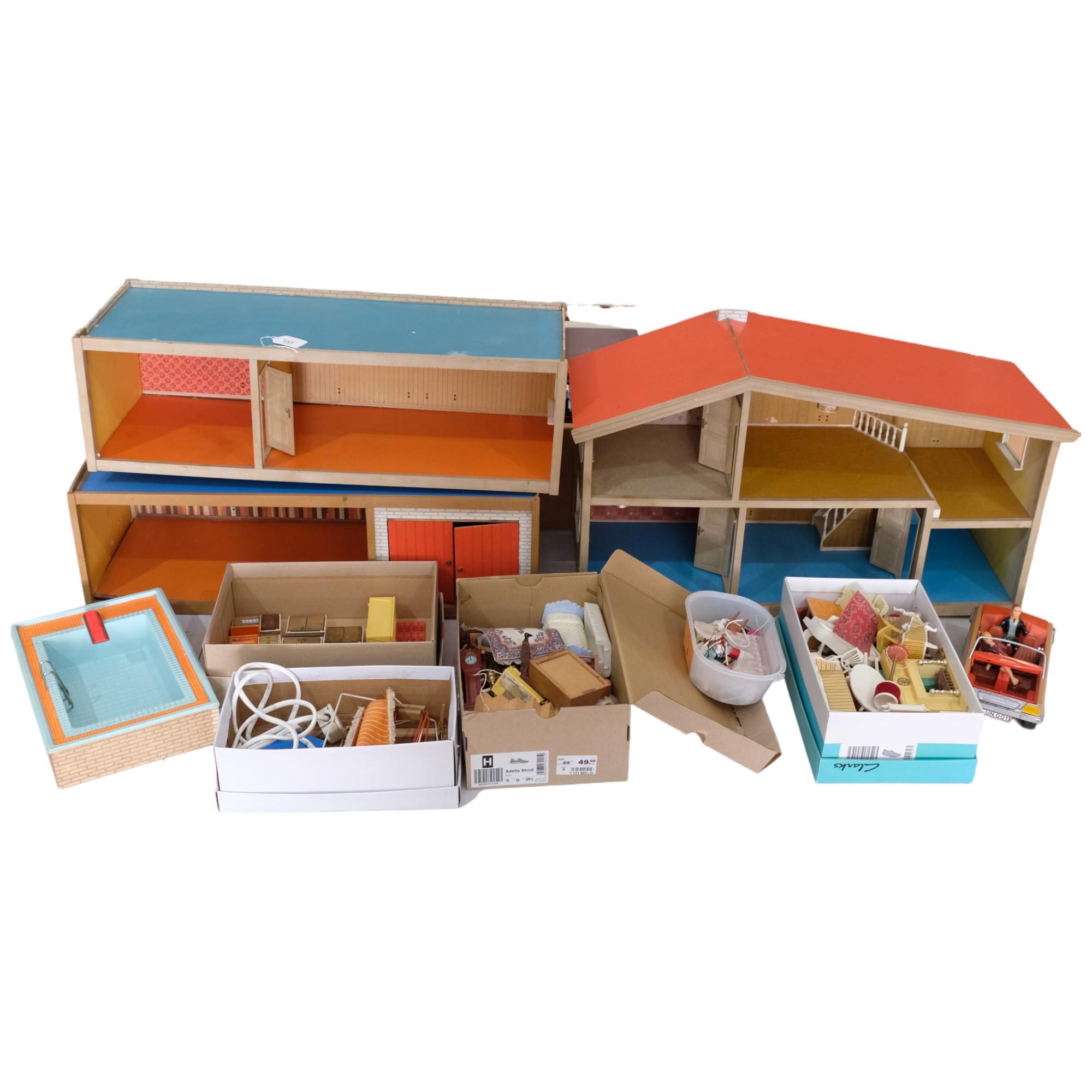 LUNDBY A large mid-century hand-built wooden doll's house, 3 separate sections including garage