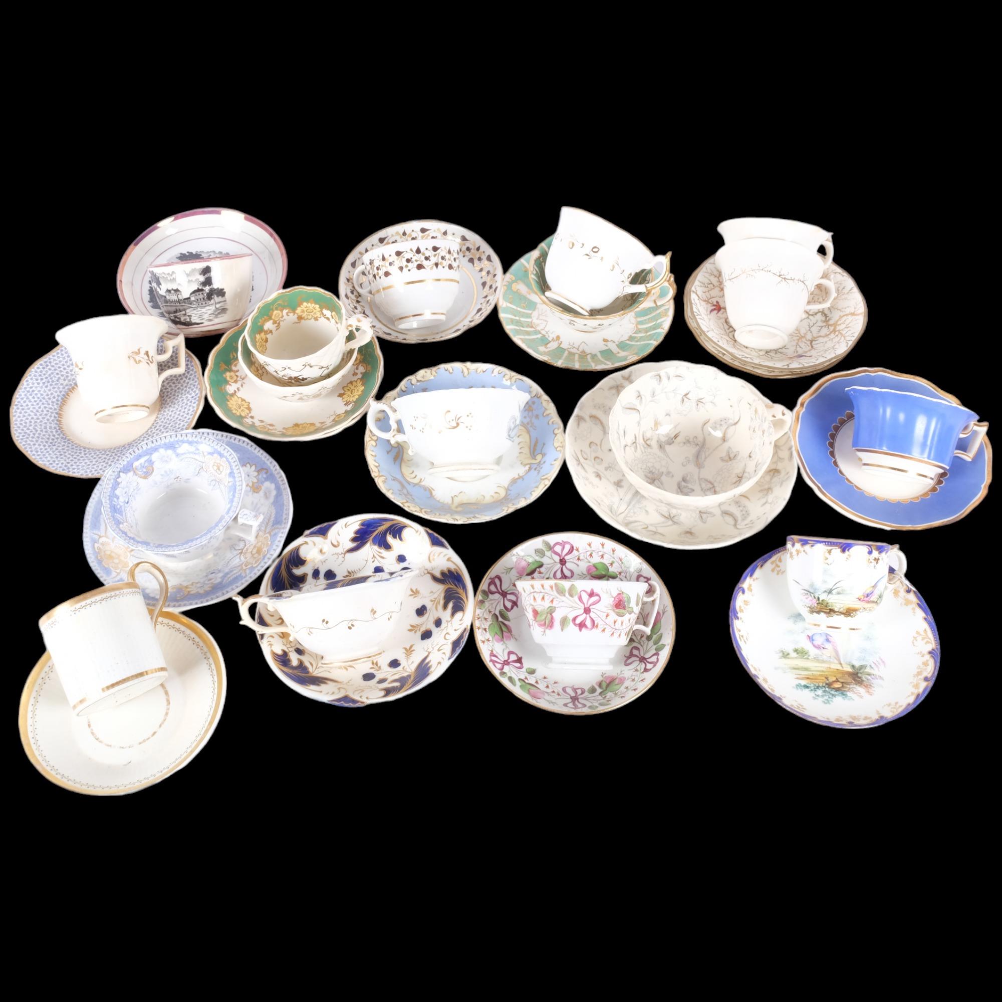 A quantity of early 19th century and later cabinet cups and saucers including Rockingham, Sunderland