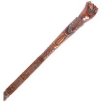 An ornately carved 19th century Folk Art walking stick, with inlaid metal playing card design