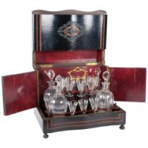 A 19th century Napoleon III French ebonised and rosewood banded table top liqueur cabinet, the
